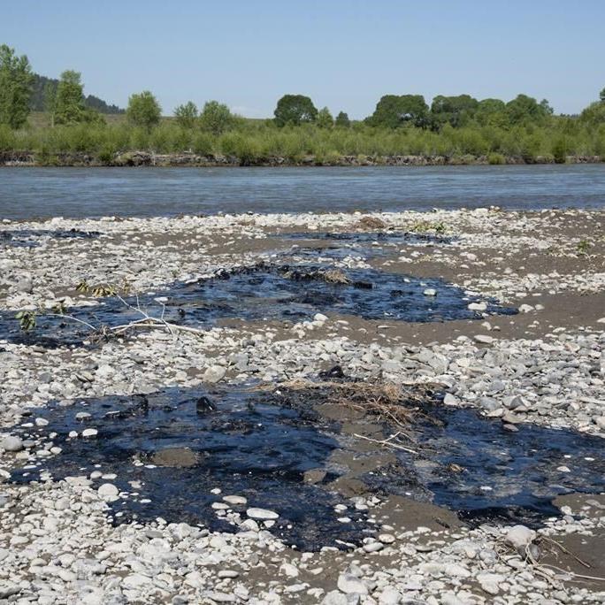 Cleanup begins after asphalt binder spill into Montana's Yellowstone River after train derailment
